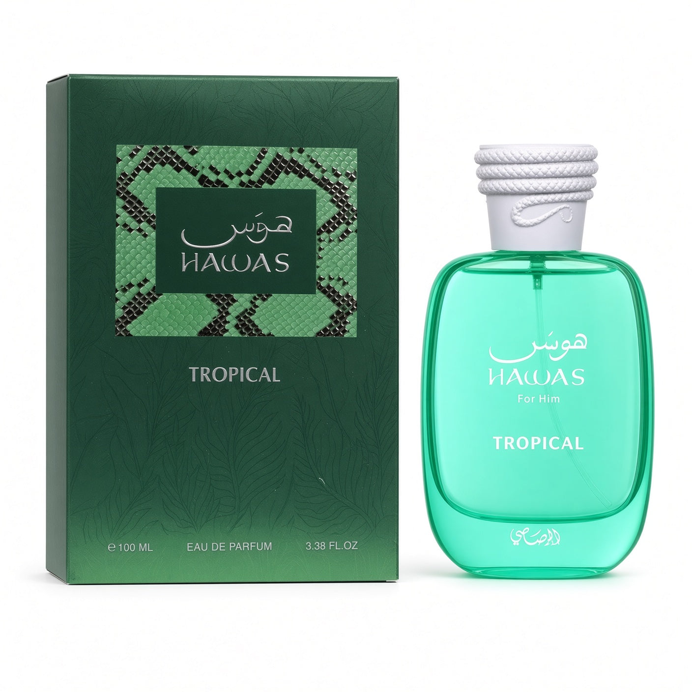 Hawas Tropical Eau de Parfum bottle and its green packaging box, featuring a translucent mint green glass bottle with a white cap next to a dark green textured box.