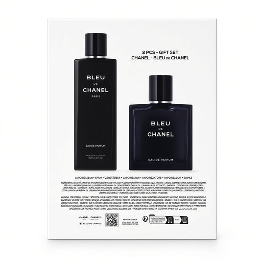 Chanel Bleu de Chanel gift set containing a 100ml spray bottle and a 100ml perfume bottle, both in black packaging with white lettering, presented on a white background with product details and a QR code printed below.