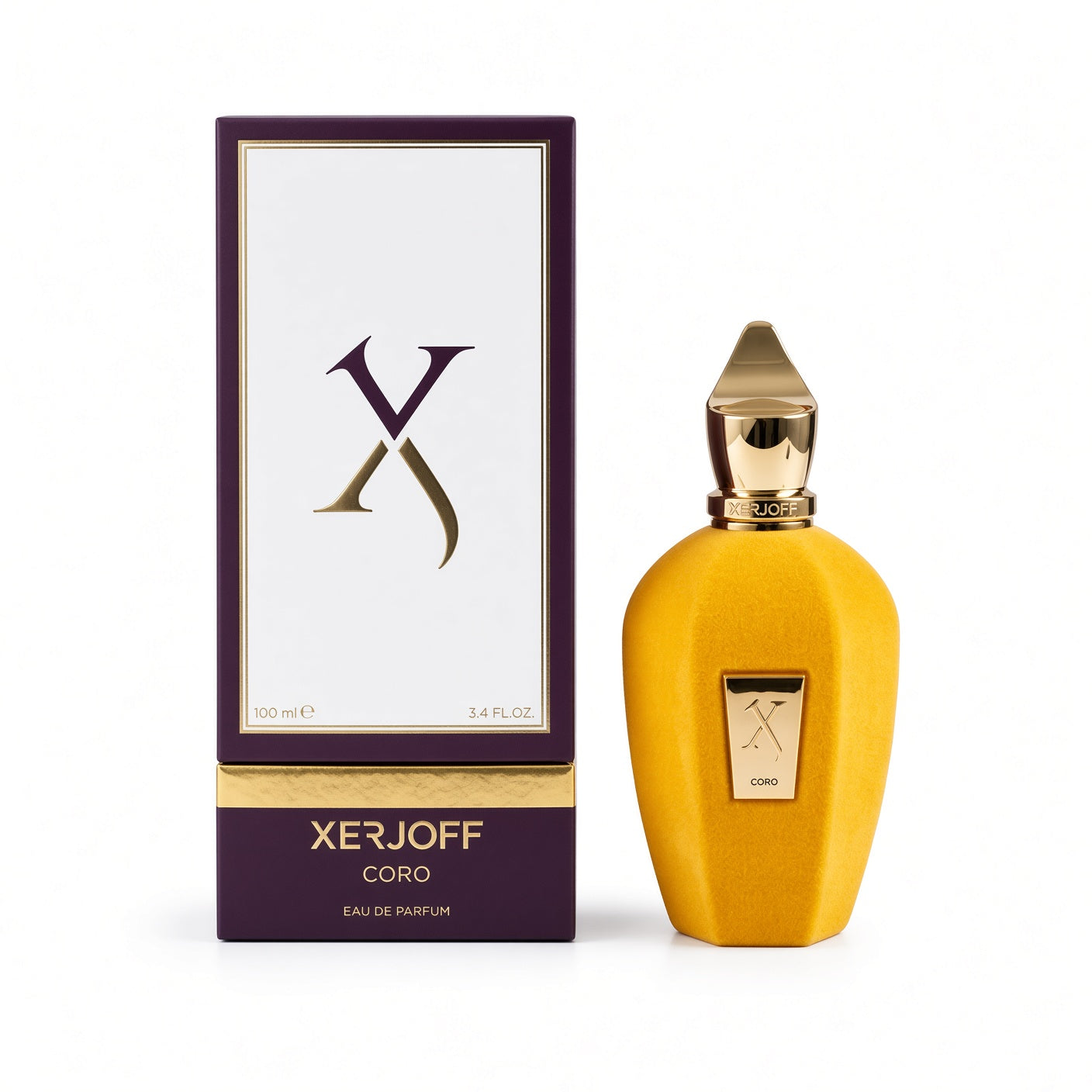 Xerjoff Coro Eau de Parfum bottle in a textured mustard yellow finish with a gold cap, shown next to its dark purple and white packaging box.