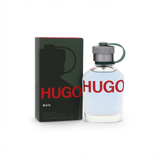 Hugo Man Eau de Toilette bottle and packaging box on a white background. The bottle is clear glass with a light blue liquid and a dark green cap loop, while the box is dark green with a silhouette and bold red 'HUGO' text.